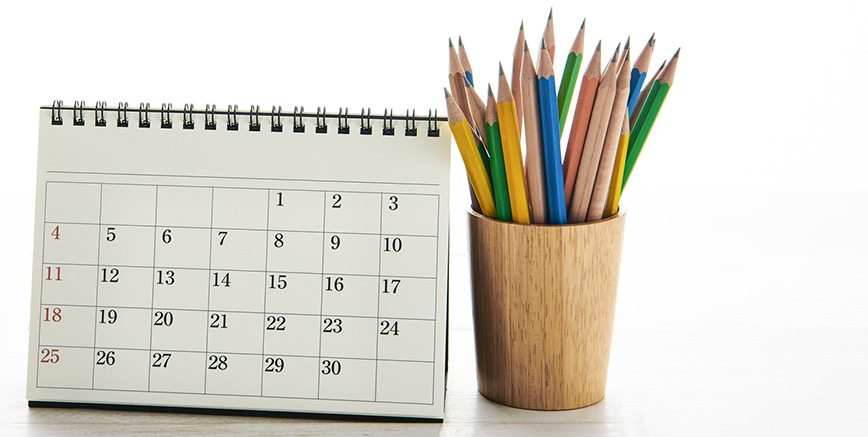 Image of a calendar and pencil