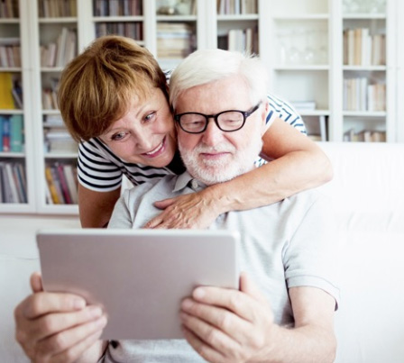 Image of a couple using a tablet device