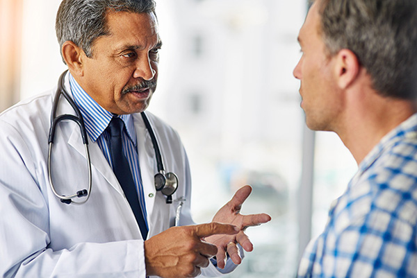 A doctor discussing with a patient